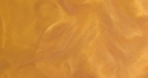 Abstract Liquid Gold Shimmering Background