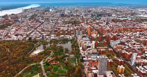 One corner of the Central Park in New York and urban landscape at day.