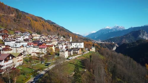 Astonishing View Of Dolomites Village Located Near Deep Green Valley, Italy