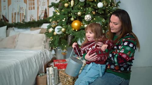 Mother and Child Celebrate Christmas at Home