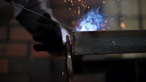 Arc Welding Sparks on Steel Beam