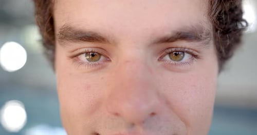 Close-up of swimmer eyes and face, focusing on determination and intensity