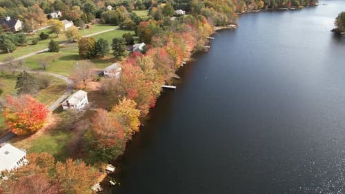 Colorful Lakefront on Sunny Autumn Day, Aerial View of Vivid Tree Colors and Lakefront Homes on in N
