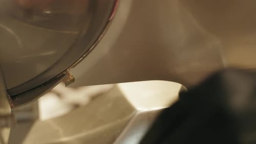 Slicing Meat on Stainless Steel Commercial Slicer