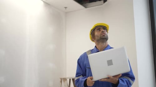 Engineer is working at tower.