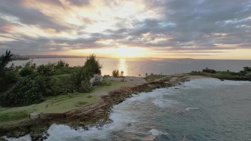 Sunset Over The Sea In Isla de Cabras National Park In Palo Seco, Puerto Rico. - aerial