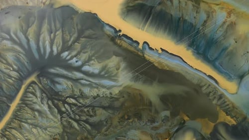 Aerial view of surreal toxic water stream from copper mine in decanting lake. Natural pattern