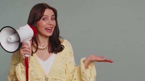Woman Talking with Megaphone Proclaiming News Loudly Announcing Advertisement Pointing Empty Place