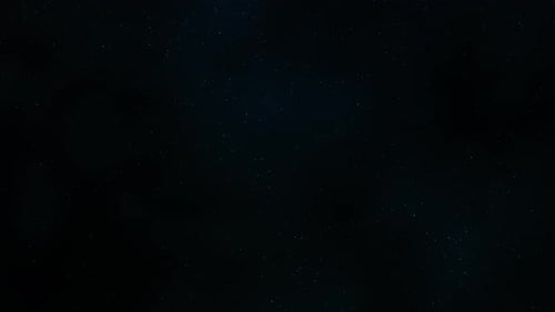 Glamour Collection: Tiny blue particles dispersing on a black background