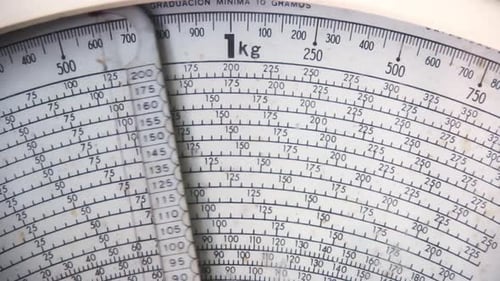 A Food Weight Scale at Grocery Store. Close Up.