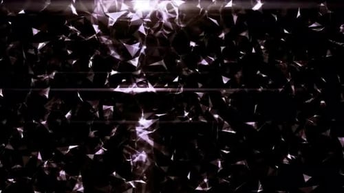 Les particules scintillantes brillent de mille feux dans l'obscurité