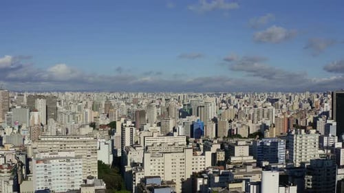 Drone Aerial Cityscape Shoot of a Big Metropolis on a Sunny Blue Sky Day. Filmed in Sao Paulo, Brazi