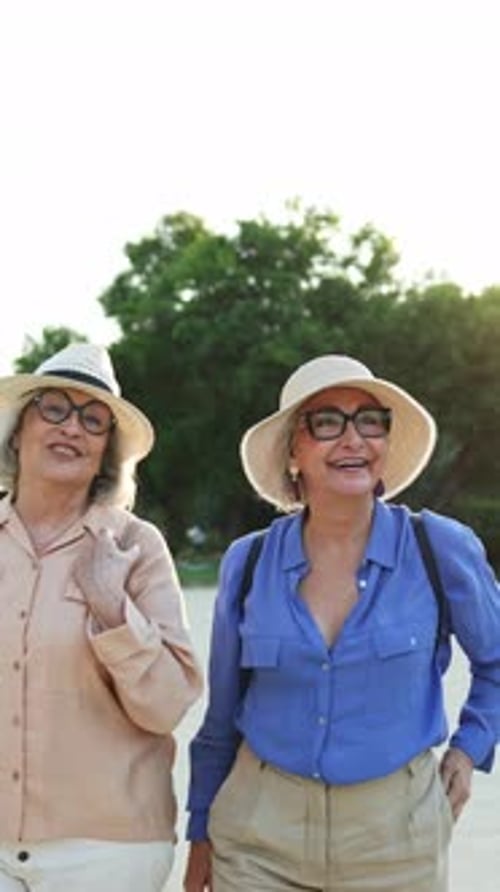 Elderly women enjoying a stroll in the park