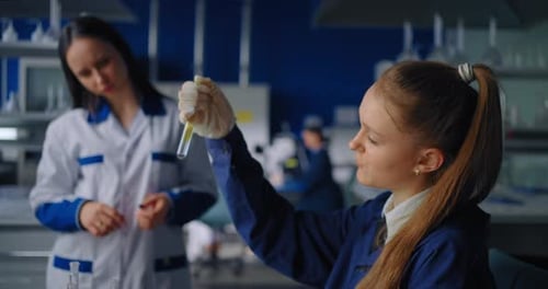 Scientists Analyze Sample in Lab Setting