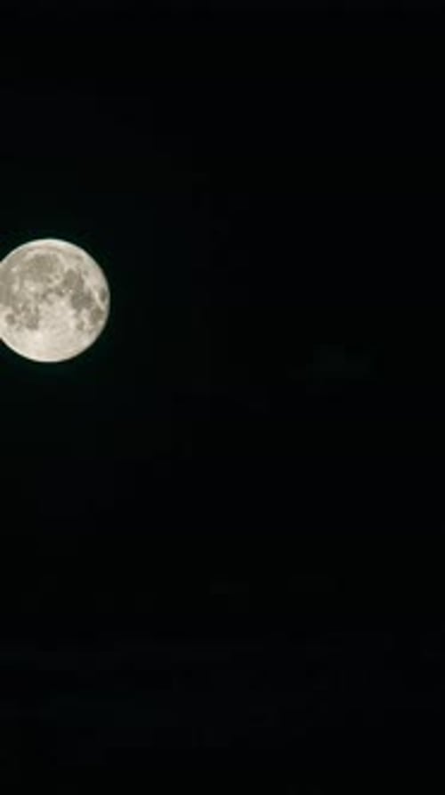 Moon in Dark Night Sky