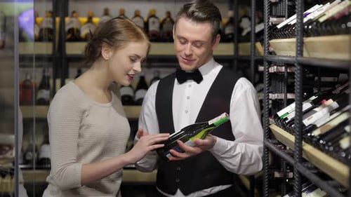 Woman Selects Wine with Wine Steward