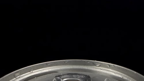 Close-Up Soda Can Top with Dewdrops. Probe lens