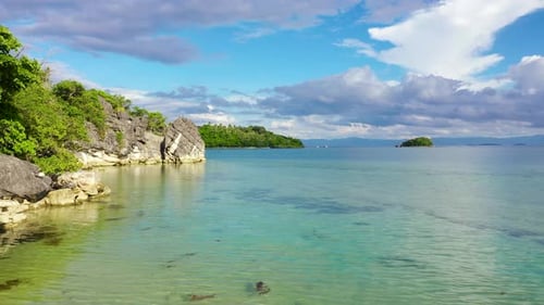 Nature Landscape Sandy Tropical Beach with Crystal Clear Sea Rocks and Tropical Beach in Caramoan