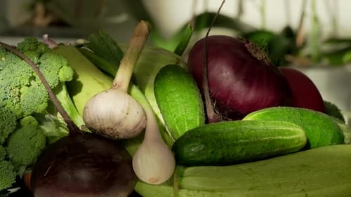 Fresh Vegetables in a Kitchen: Cucumbers, Zucchini, Broccoli