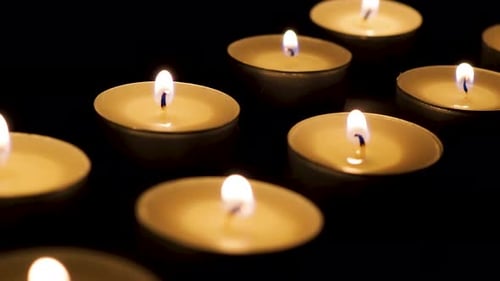 Candles in the dark dolly slide close up macro