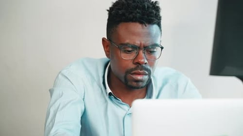 Man Working with PC Portrait in Office