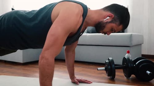 Man Doing Pushups for Fitness at Home