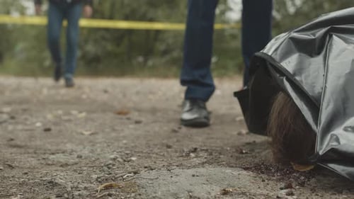 Crime Scene with Body Bag and Yellow Tape