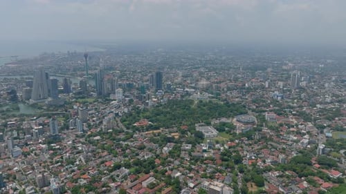 Aerial Panoramic Footage of Metropolis Forwards Fly High Above Large City in Flat Landscape Group of