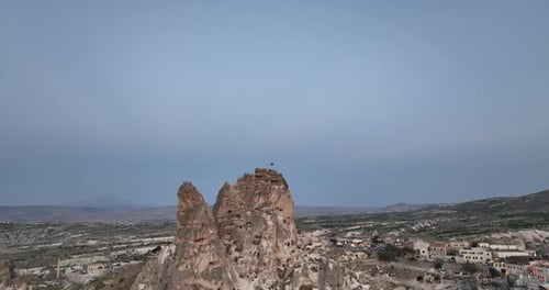 Aerial View of Natural Rock Formations in the Sunset Valley with Cave Houses in Cappadocia Turkey