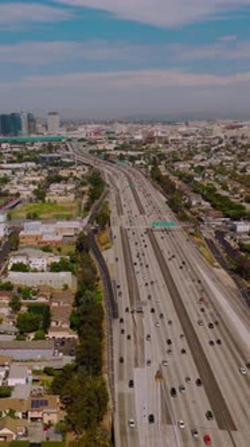 Drone view of american district. Los-Angeles city buildings aerial view. Vertical video