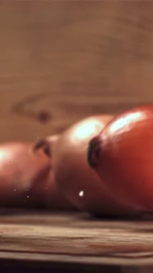 Onions Fall on the Table Filmed on a Highspeed Camera at 1000 Fps