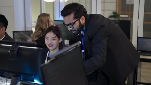 Group of programmers are coding at office.