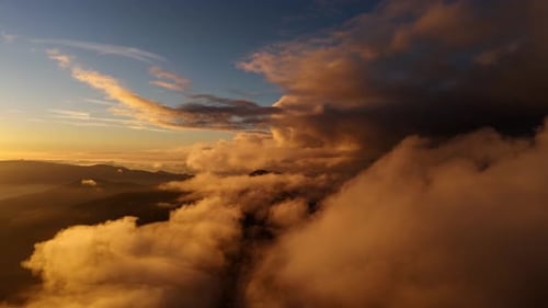 Aerial View of Clouds Heaven at Golden Sunset
