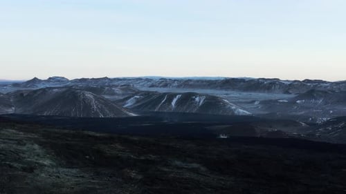 Wild spectacular volcanic landscape in highlands of Iceland with dark basalt rock