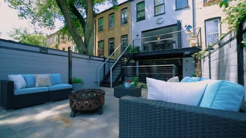 Modern Brooklyn garden of luxury brick house, cozy furniture in outside backyard