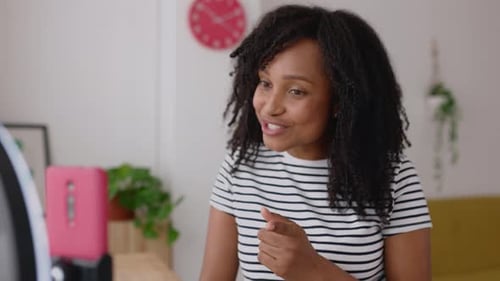 Happy Female Creative Creator Recording Social Media Content with Cell Phone