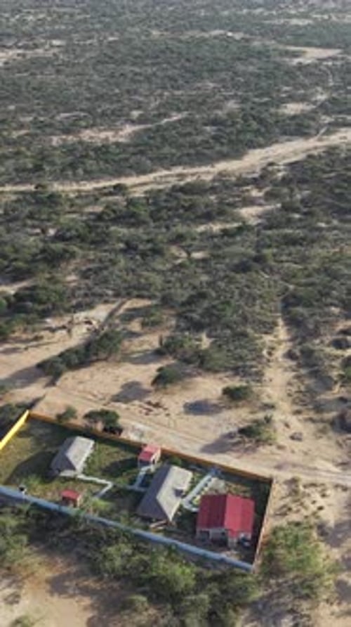 Aerial Vertical Drone Video of Wayuu Rancheria in La Guajira Desert, Colombia