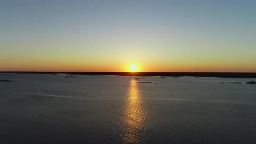 Beautiful drone footage of sunset over the sea