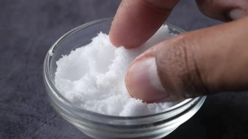 White Crystals in a Bowl Close Up