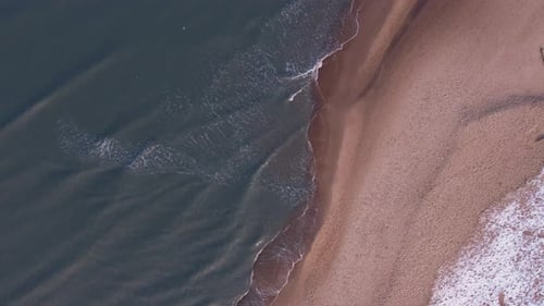 Winter in Cold Baltic Sea Snowy Beach in Gdansk Aerial View of Snow Covered Beach and Dunes Dark