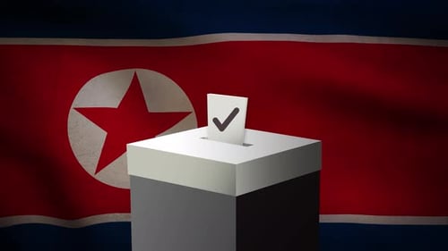 Casting vote into the ballot box during North Korea election