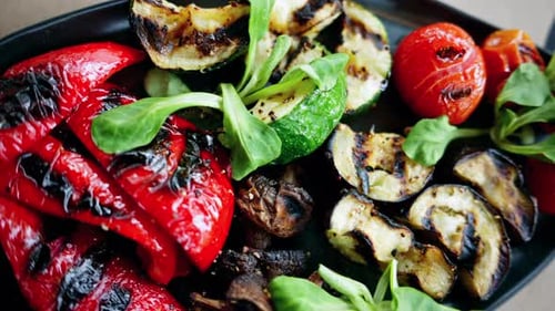 Assortment of Grilled Vegetables on a Black Plate
