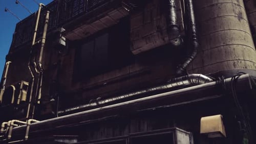 Urban Building with Industrial Pipes in a Cityscape on a Clear Day