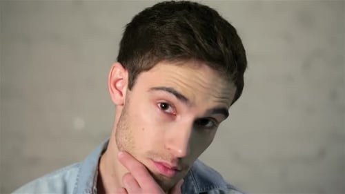 Young Adult Man Posing in Close Up Shot