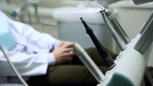 Close Up of Modern Dental Tools Ready for Patient Treatment