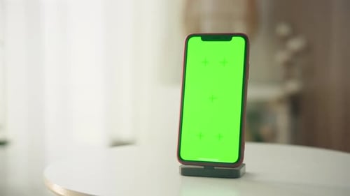 Smartphone with Green Screen on Stand for Mockup