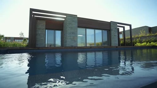 modern built house with pool in front. modern architecture house.sunny day.