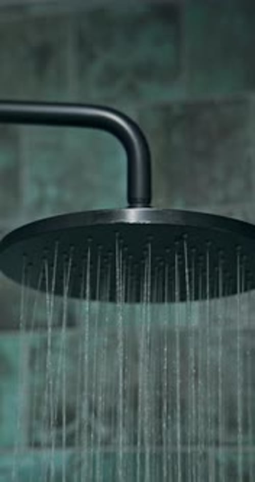 Hygiene, shower and water for cleaning in bathroom of home, hotel or resort to relax or wash