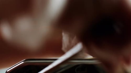Woman Using Pasta Machine to Make Fresh Pasta Dough in the Kitchen Cooking in Italian Restaurant