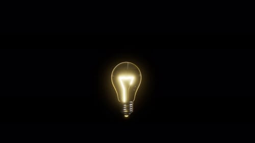 Animated Light Bulb Lighting Up with Glowing Golden Particles